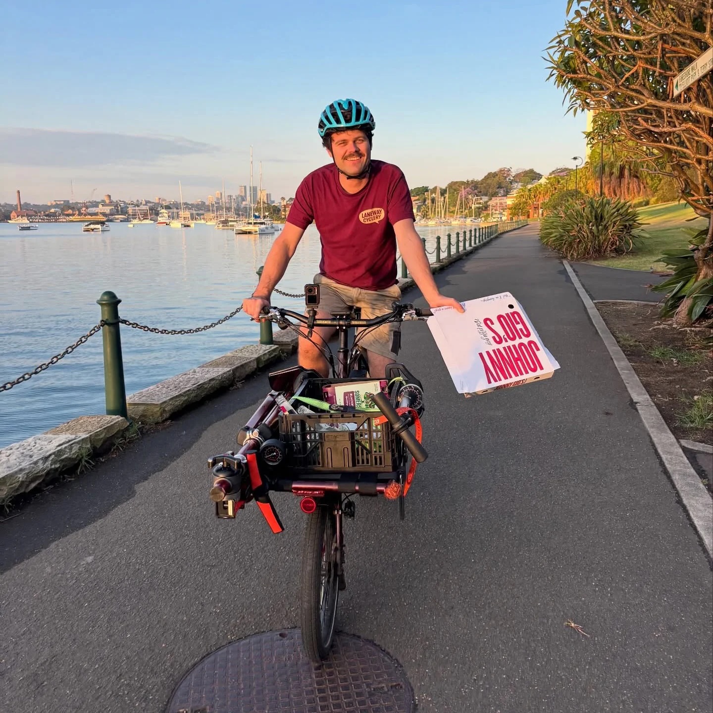 Laneway Cyclery rider with cargo bike